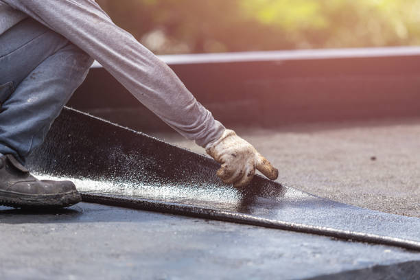 Professional Emergency Waterproofing technician working in Greensburg, IN